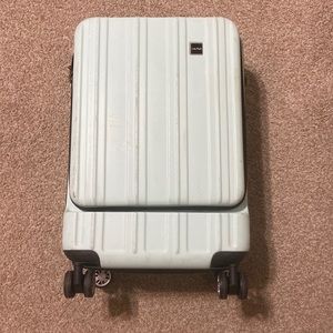 Light Blue/Teal Calpak Carry-On with Front / laptop Pocket & in USED condition